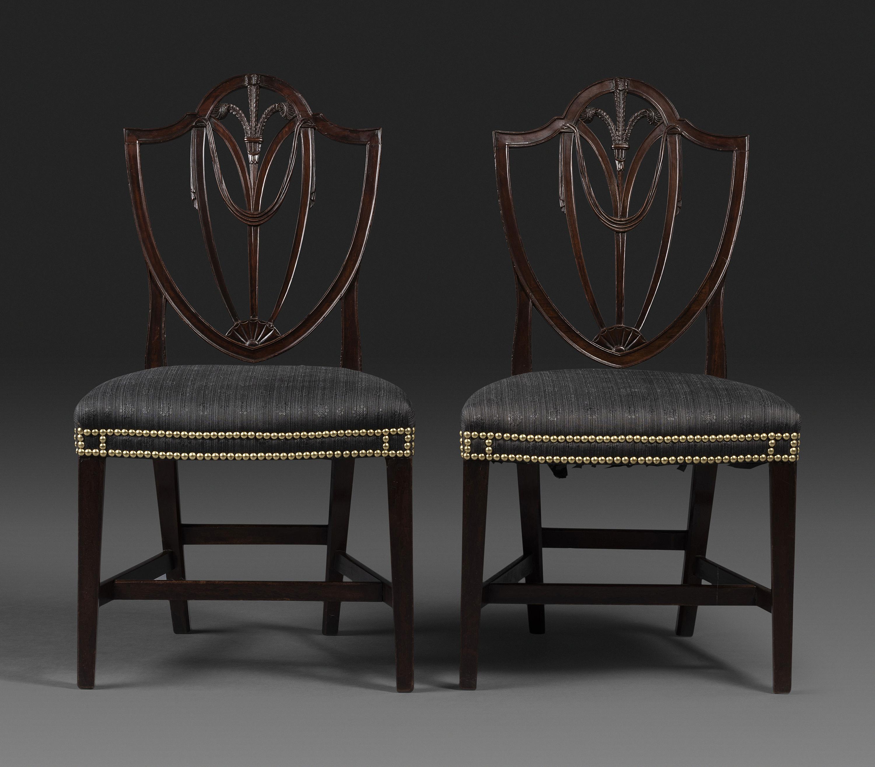 A Pair of Federal Carved Mahogany Shield-Back Dining Chairs