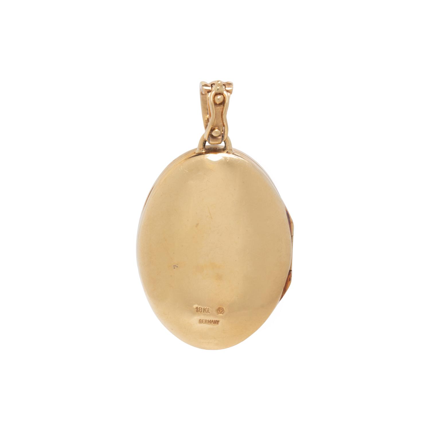 YELLOW GOLD, DIAMOND, AND ENAMEL LOCKET