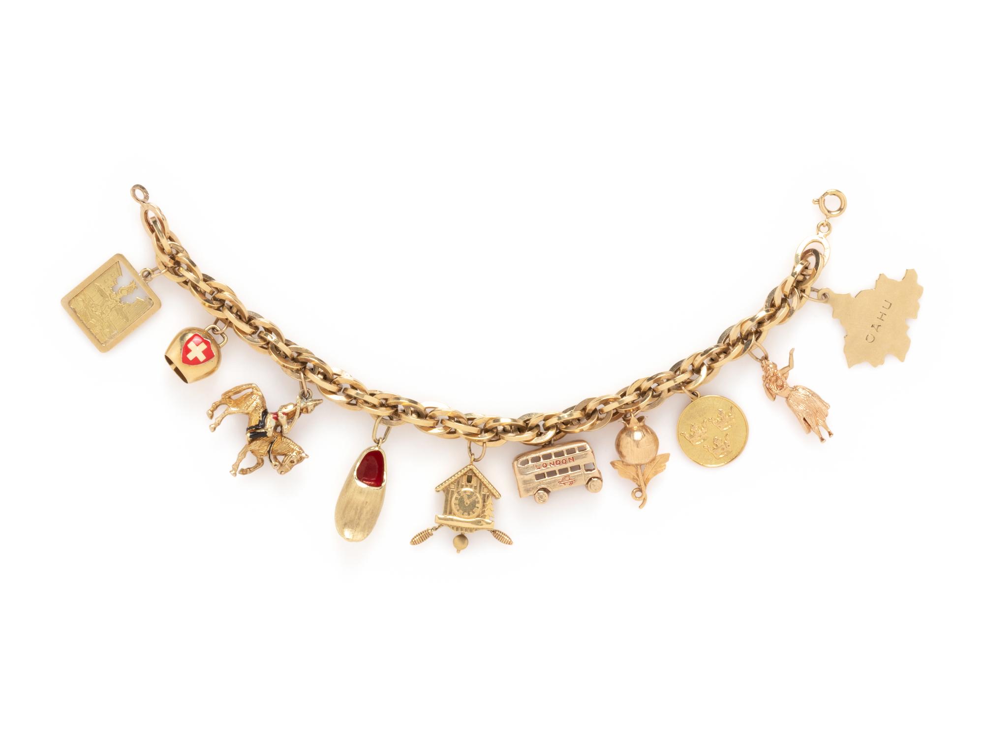 YELLOW GOLD CHARM BRACELET