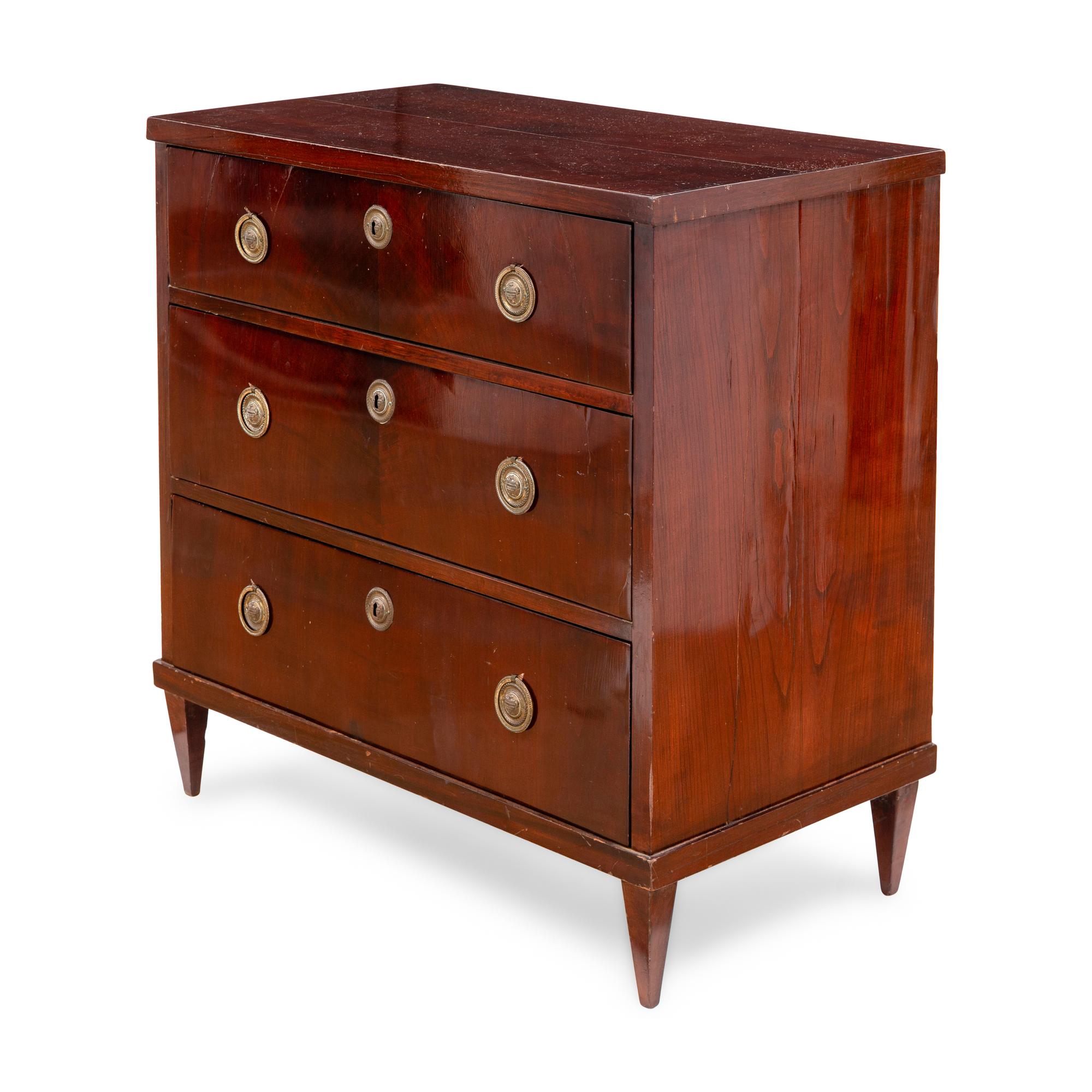 A North European Neoclassical Style Mahogany Chest of Drawers