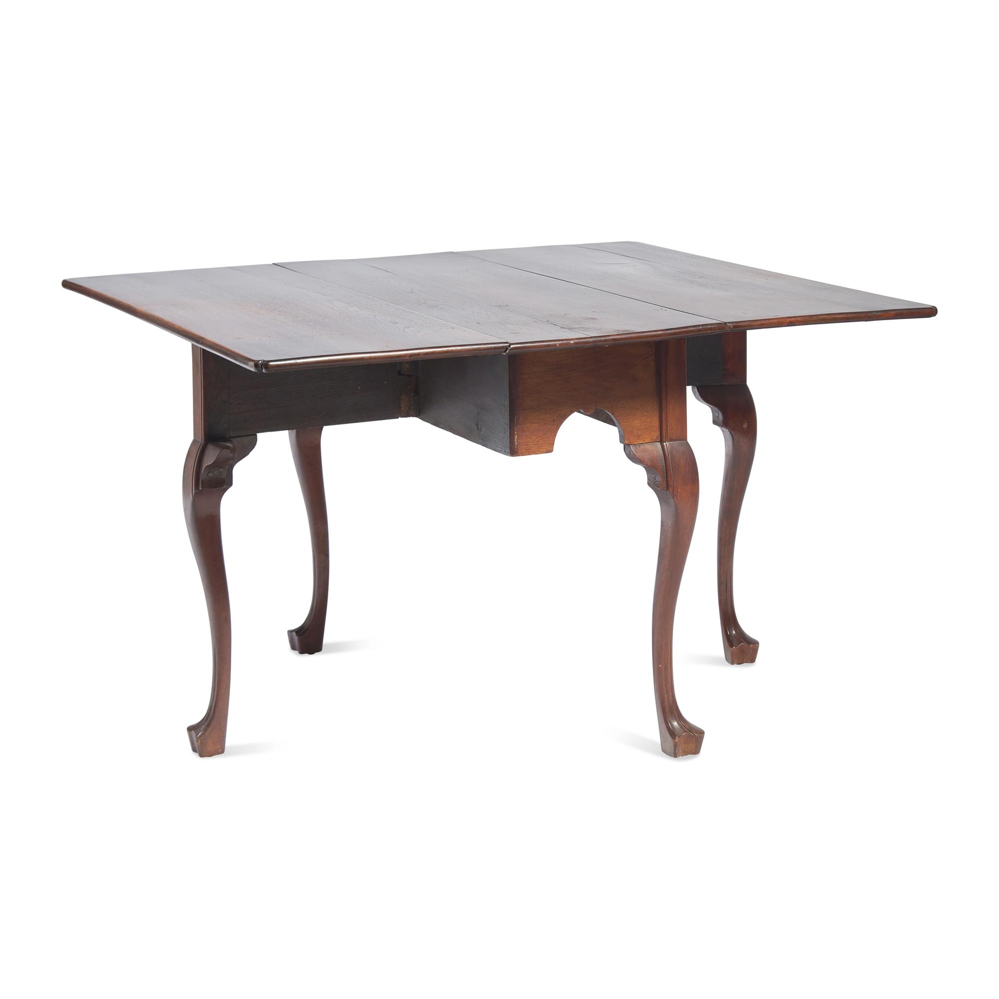 A Chippendale Carved Walnut Drop-Leaf Dining Table
