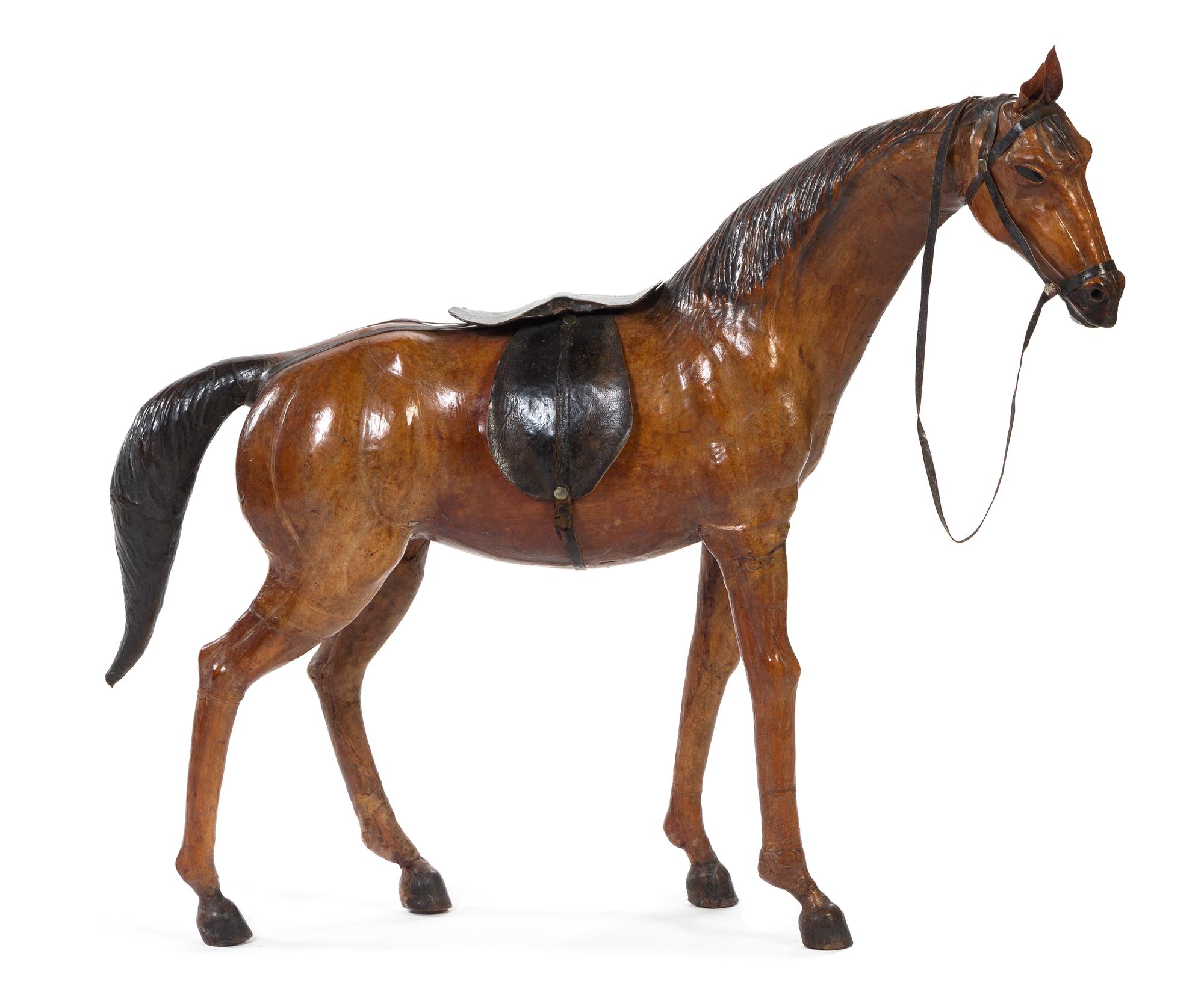 A Tooled and Painted Leather Model of a Horse Height 37 inches.