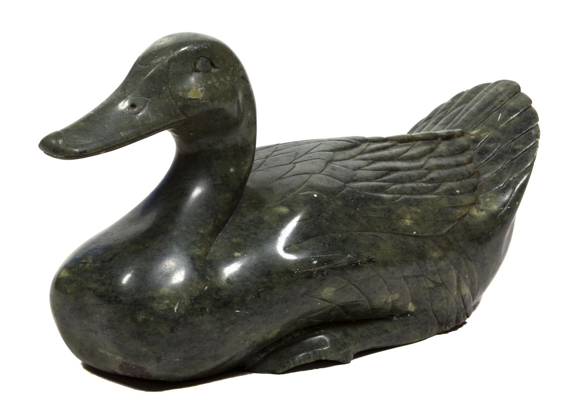 A Chinese Carved Hardstone Figure of a Duck Height 9 x length 17 inches. — 20TH CENTURY