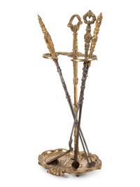 A Set of French Gilt Metal and Iron Fire Tools and Stand