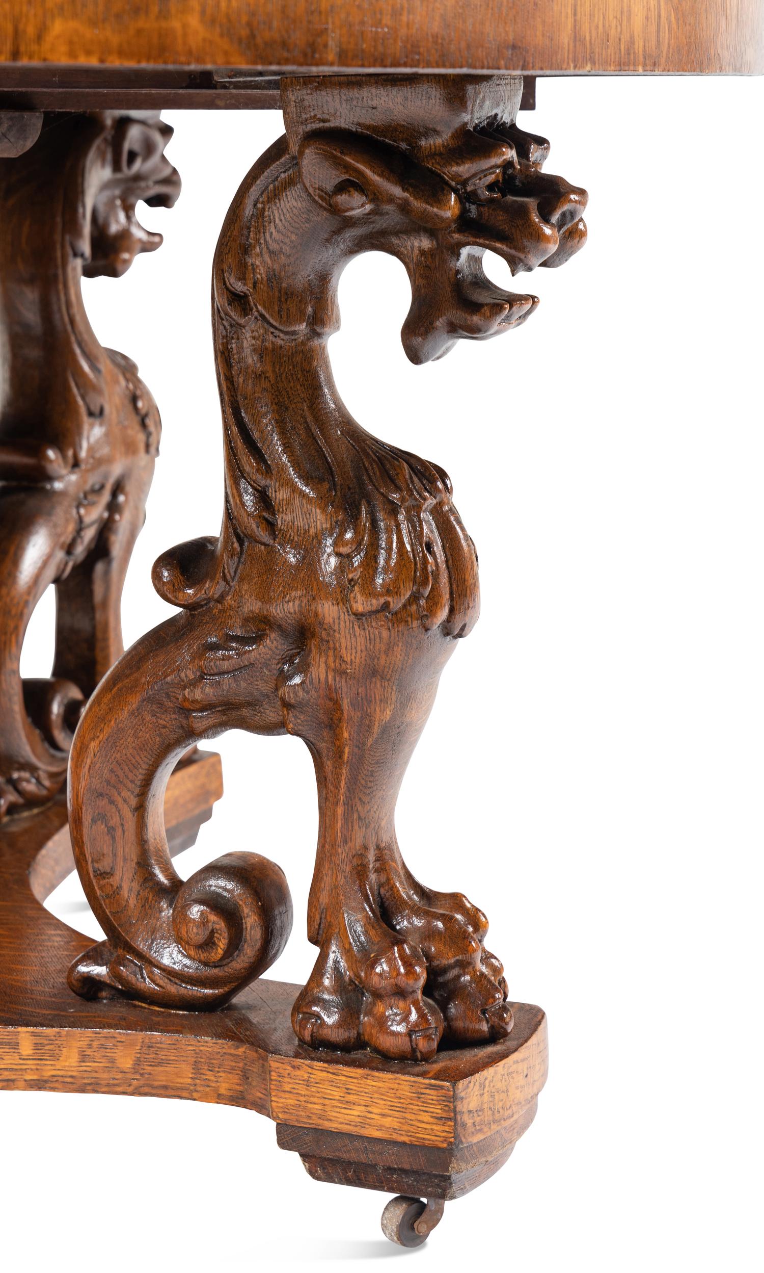 A Renaissance Revival Carved Oak Dining Table in the Manner of R. J. Horner