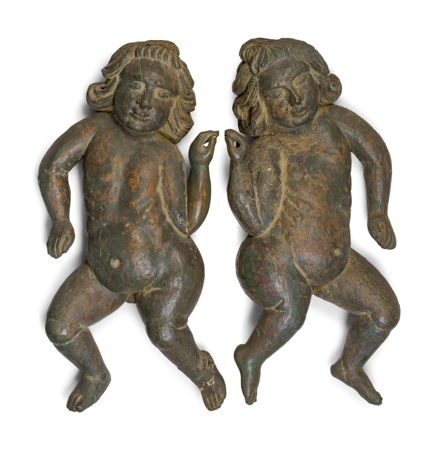 A Pair of Continental Carved and Painted Wood Putti