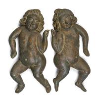 A Pair of Continental Carved and Painted Wood Putti