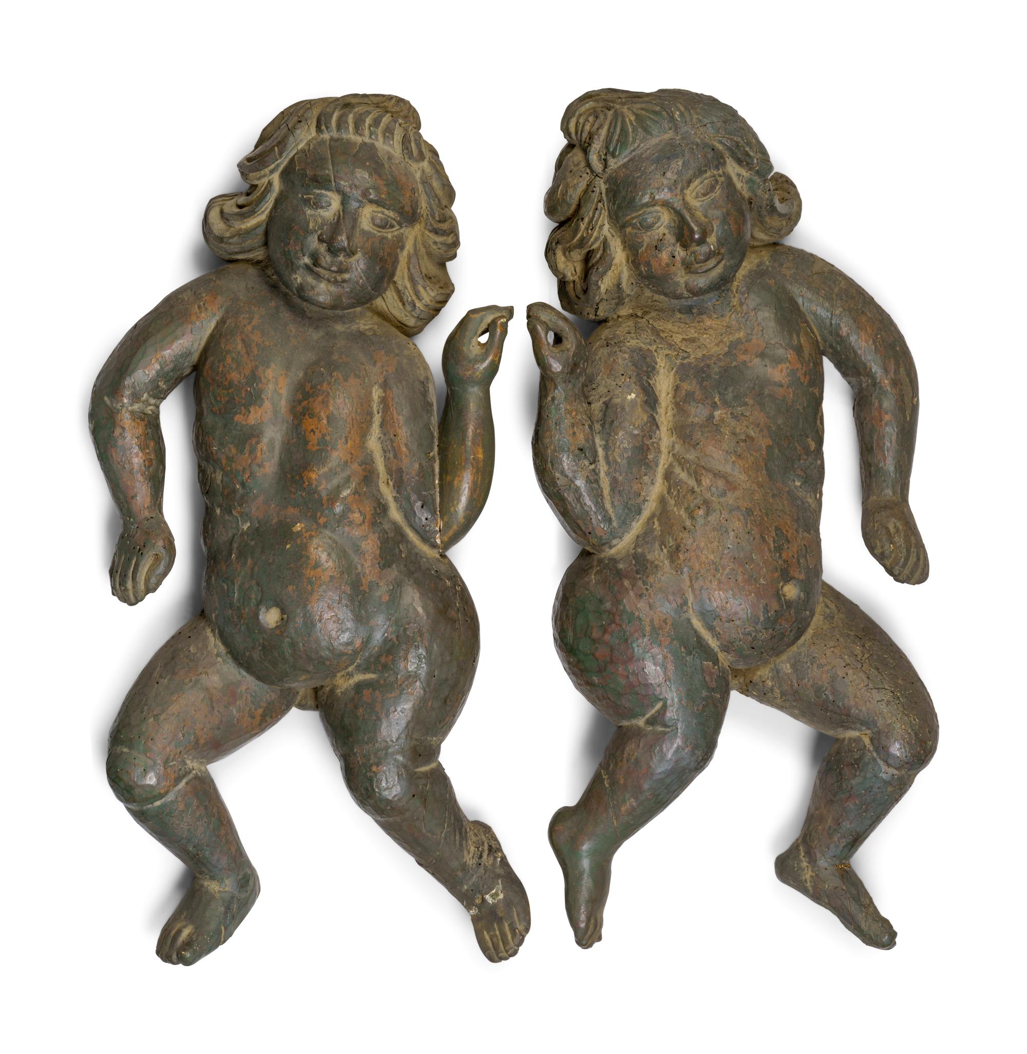 A Pair of Continental Carved and Painted Wood Putti