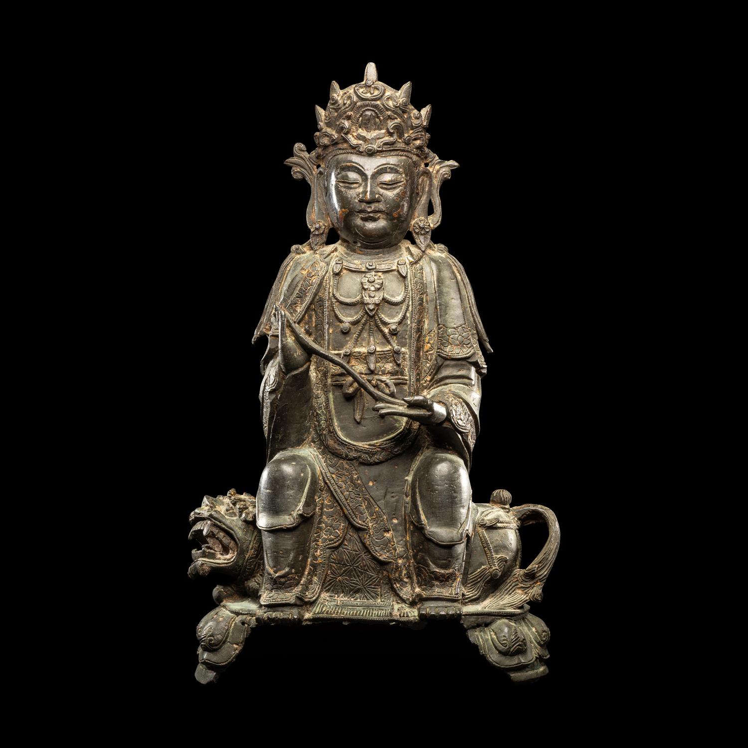 A Chinese Parcel-Gilt Bronze Figure of Guanyin, Ming Dynasty 明 銅局部鎏金觀音坐像