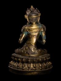 An Unusual Gilt Bronze Figure of Seated Maitreya