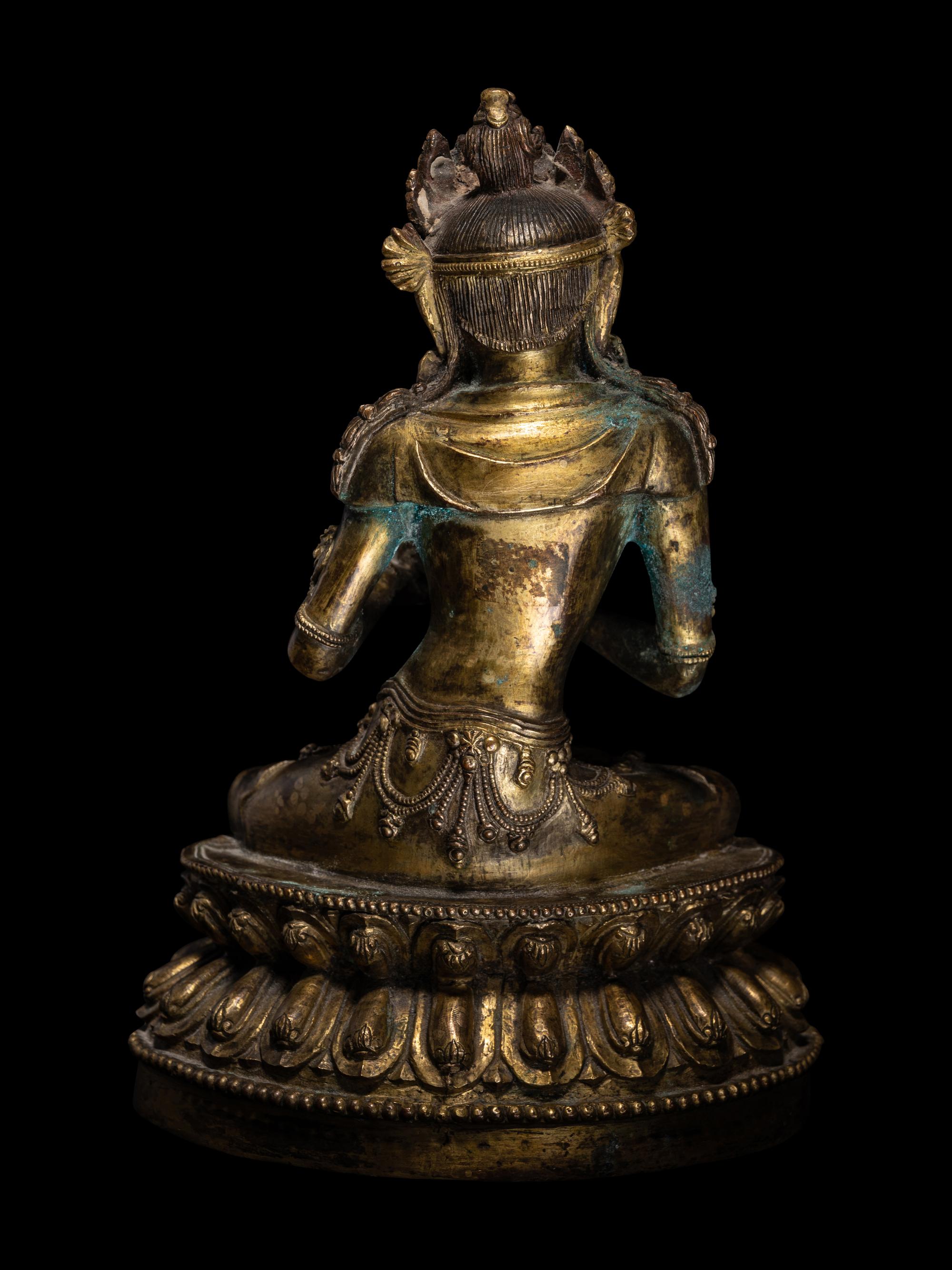 An Unusual Gilt Bronze Figure of Seated Maitreya