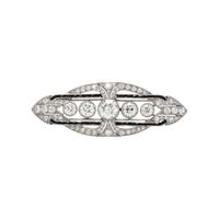 ART DECO, PLATINUM, DIAMOND, AND ONYX BROOCH