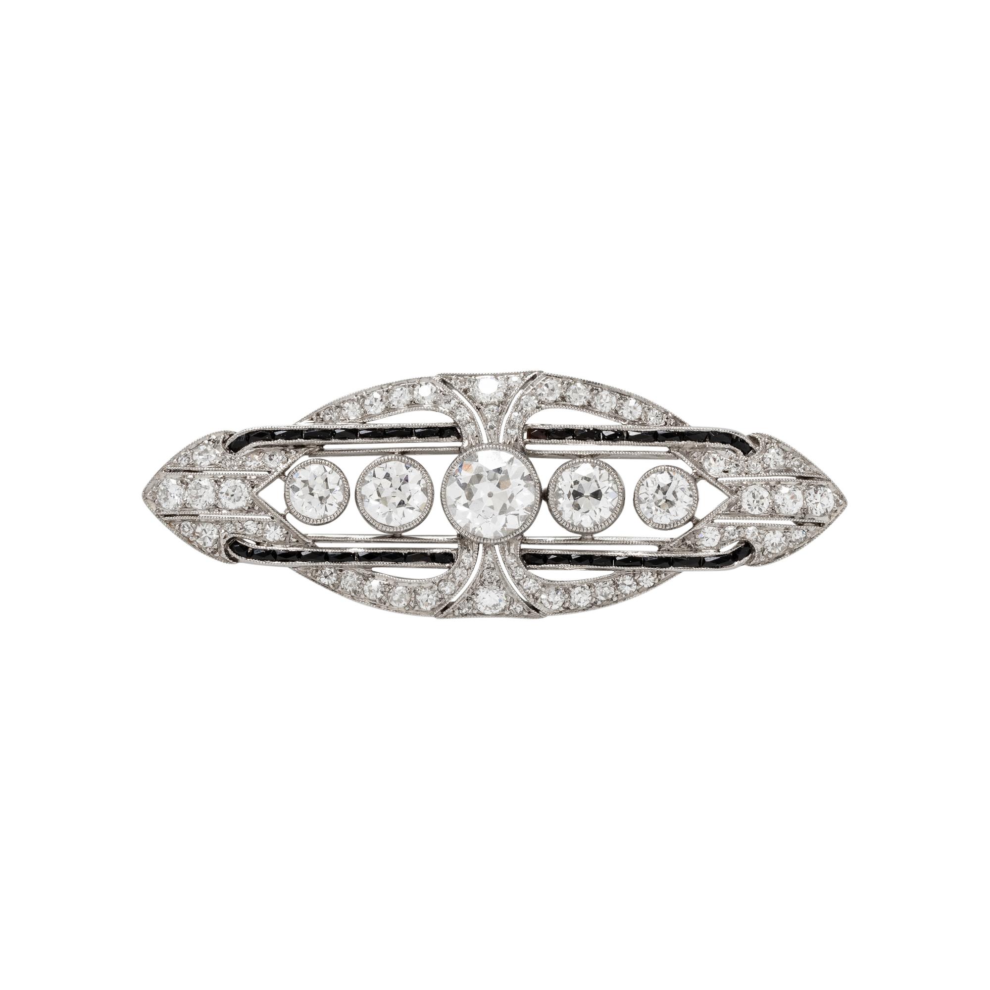 ART DECO, PLATINUM, DIAMOND, AND ONYX BROOCH