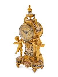 A French Gilt Bronze and Champlevé Figural Mantel Clock