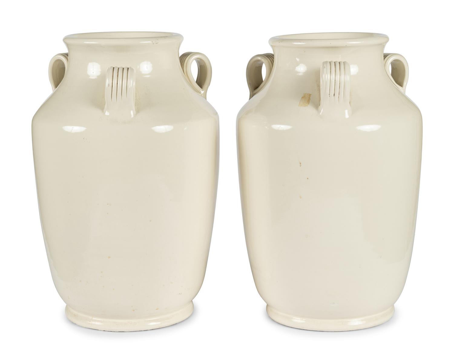 A Pair of Cream Glazed Earthenware Vases