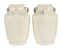A Pair of Cream Glazed Earthenware Vases