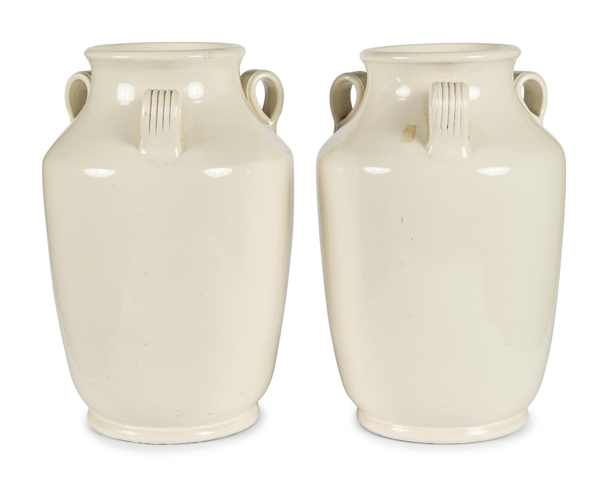 A Pair of Cream Glazed Earthenware Vases