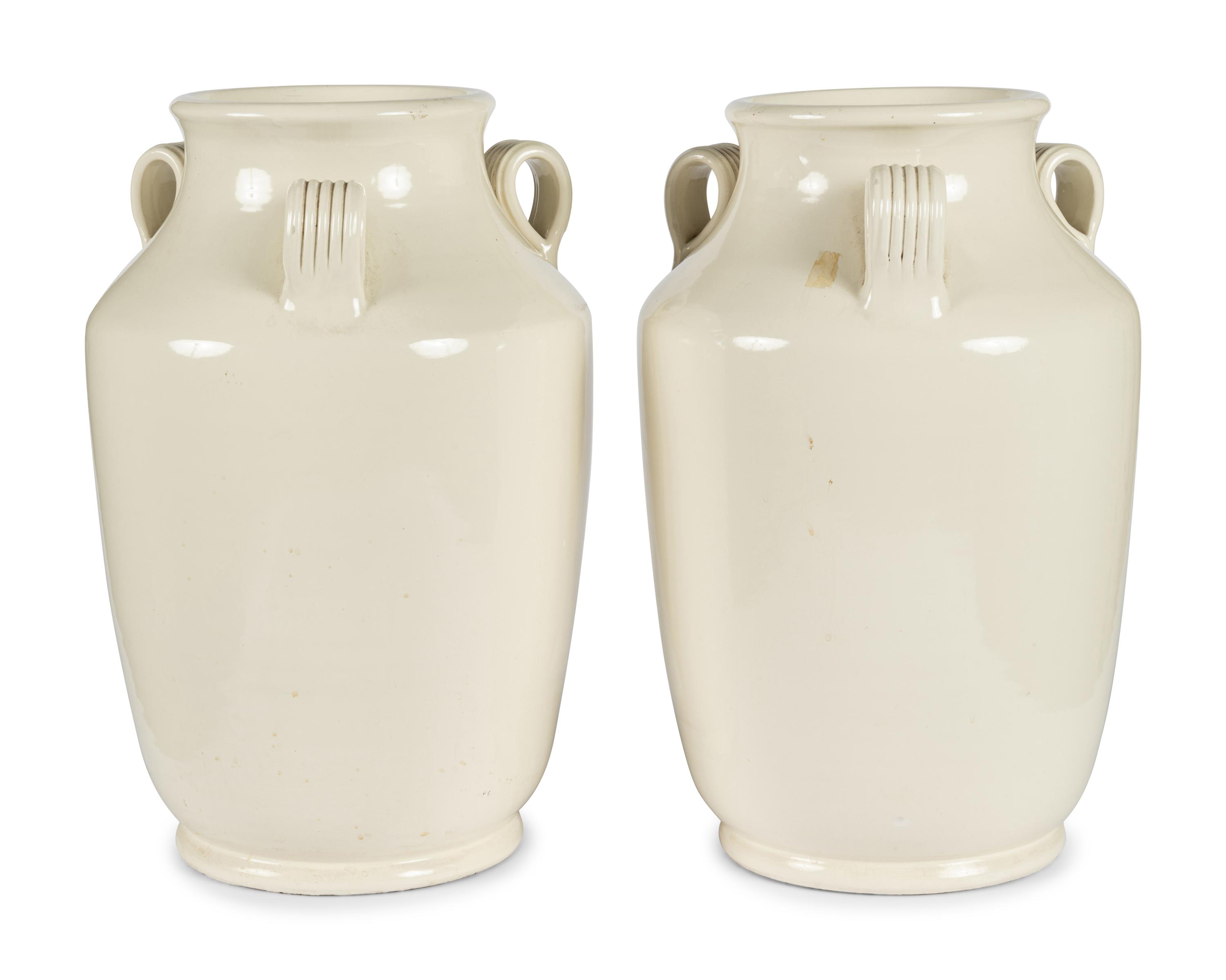 A Pair of Cream Glazed Earthenware Vases