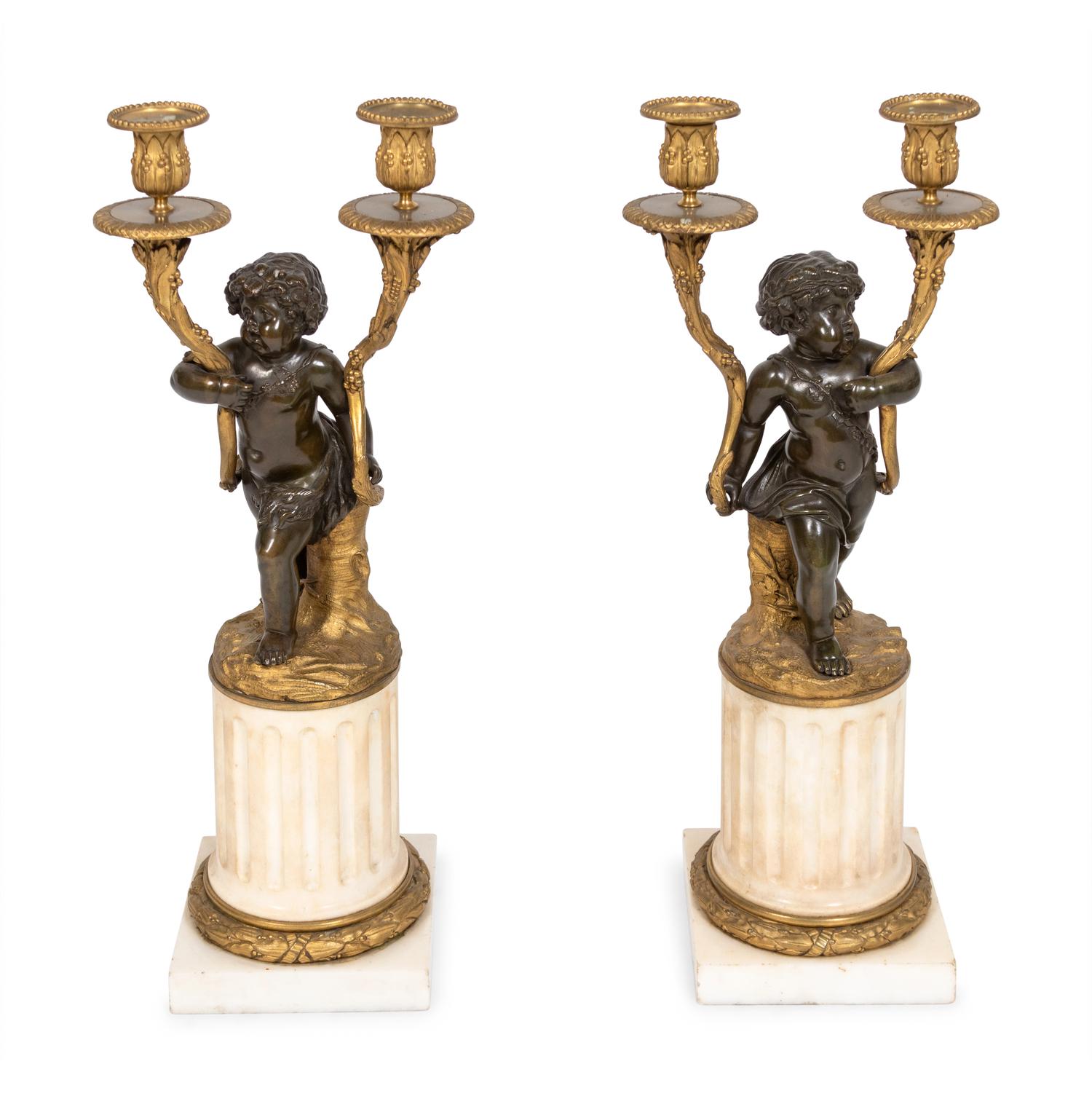 A Pair of Louis XVI Parcel-Gilt and Patinated Bronze Candelabra