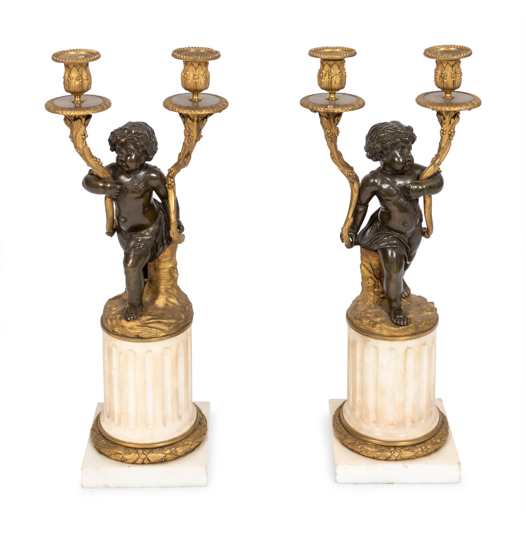 A Pair of Louis XVI Parcel-Gilt and Patinated Bronze Candelabra