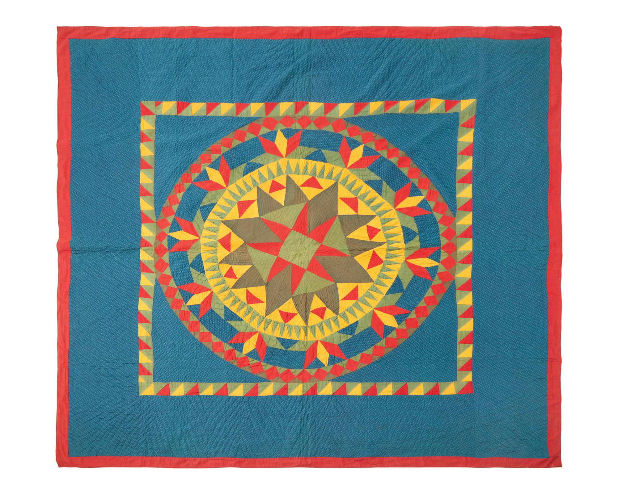 A Pieced Cotton "Mariner's Compass" Pattern Quilt