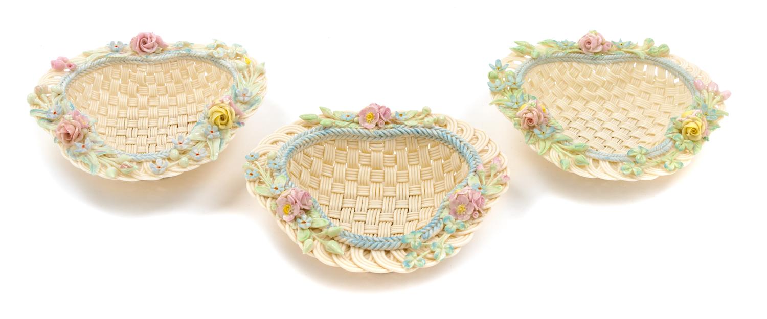 Three Belleek Four Strand Erne Baskets Width 6 1/2 inches.