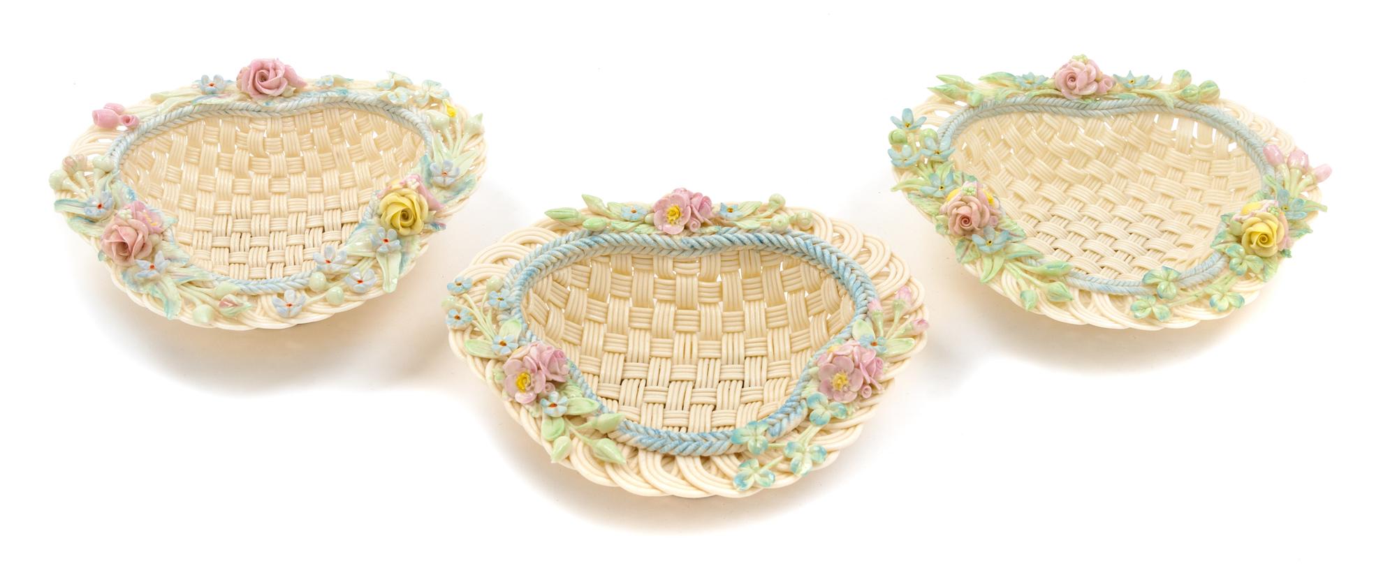 Three Belleek Four Strand Erne Baskets Width 6 1/2 inches.