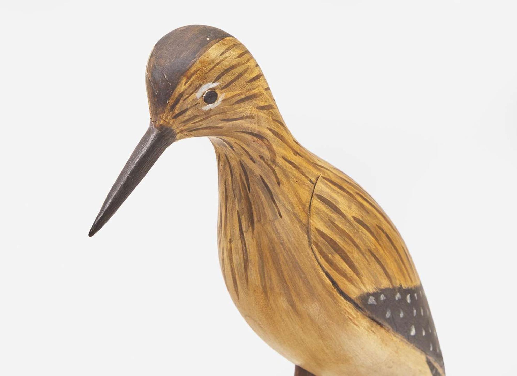 A group of three carved and painted game and shorebird decoys, 20th century