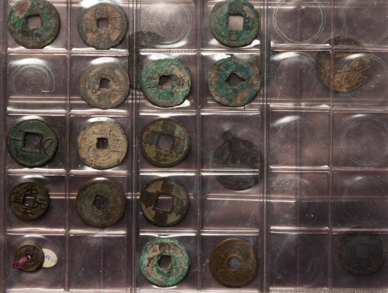 A Large Collection of Chinese Coins and Pendants