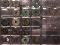 A Large Collection of Chinese Coins and Pendants
