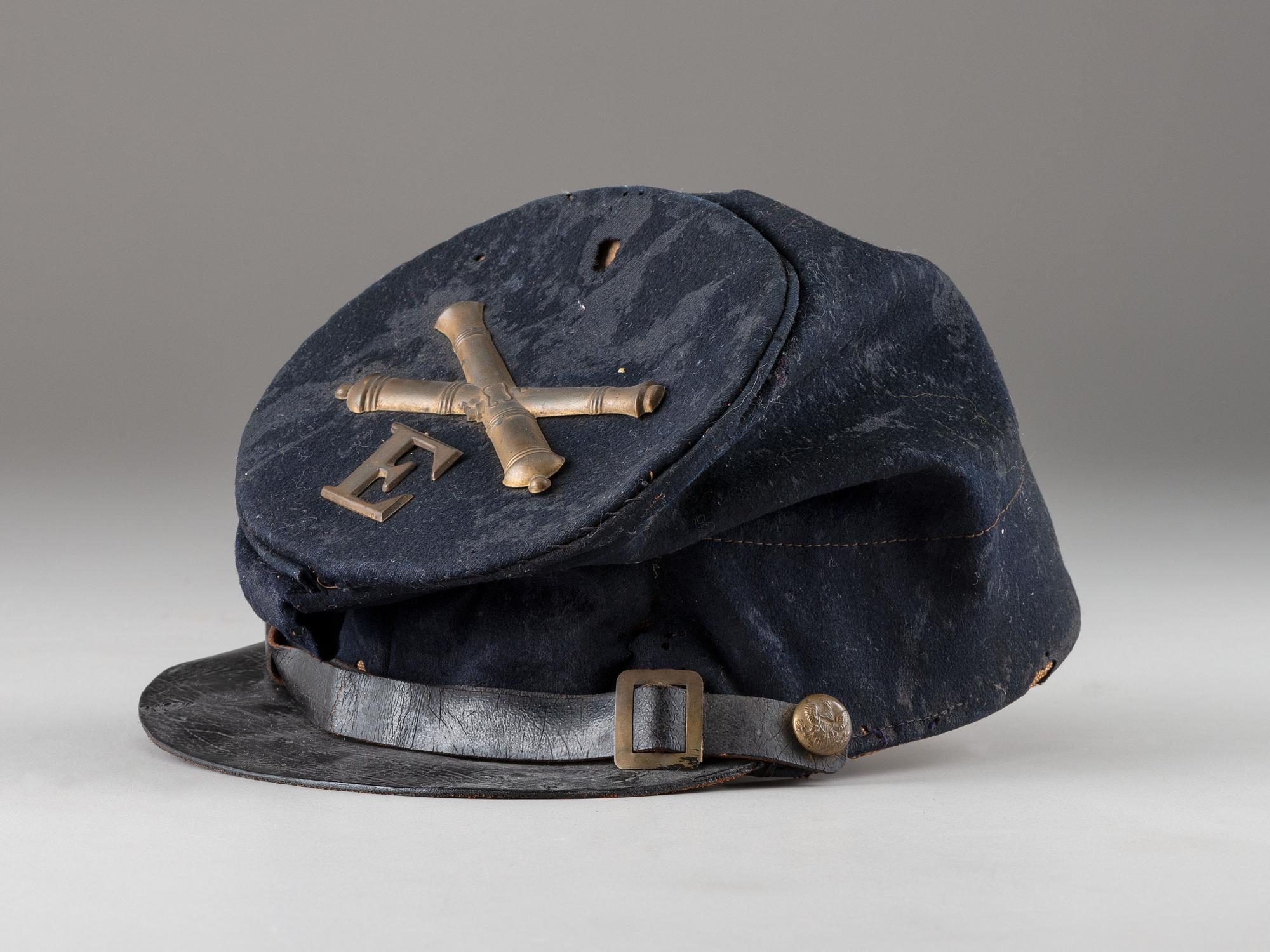 [CIVIL WAR]. 1858 forage cap, Battery E Artillery, with possible identification.