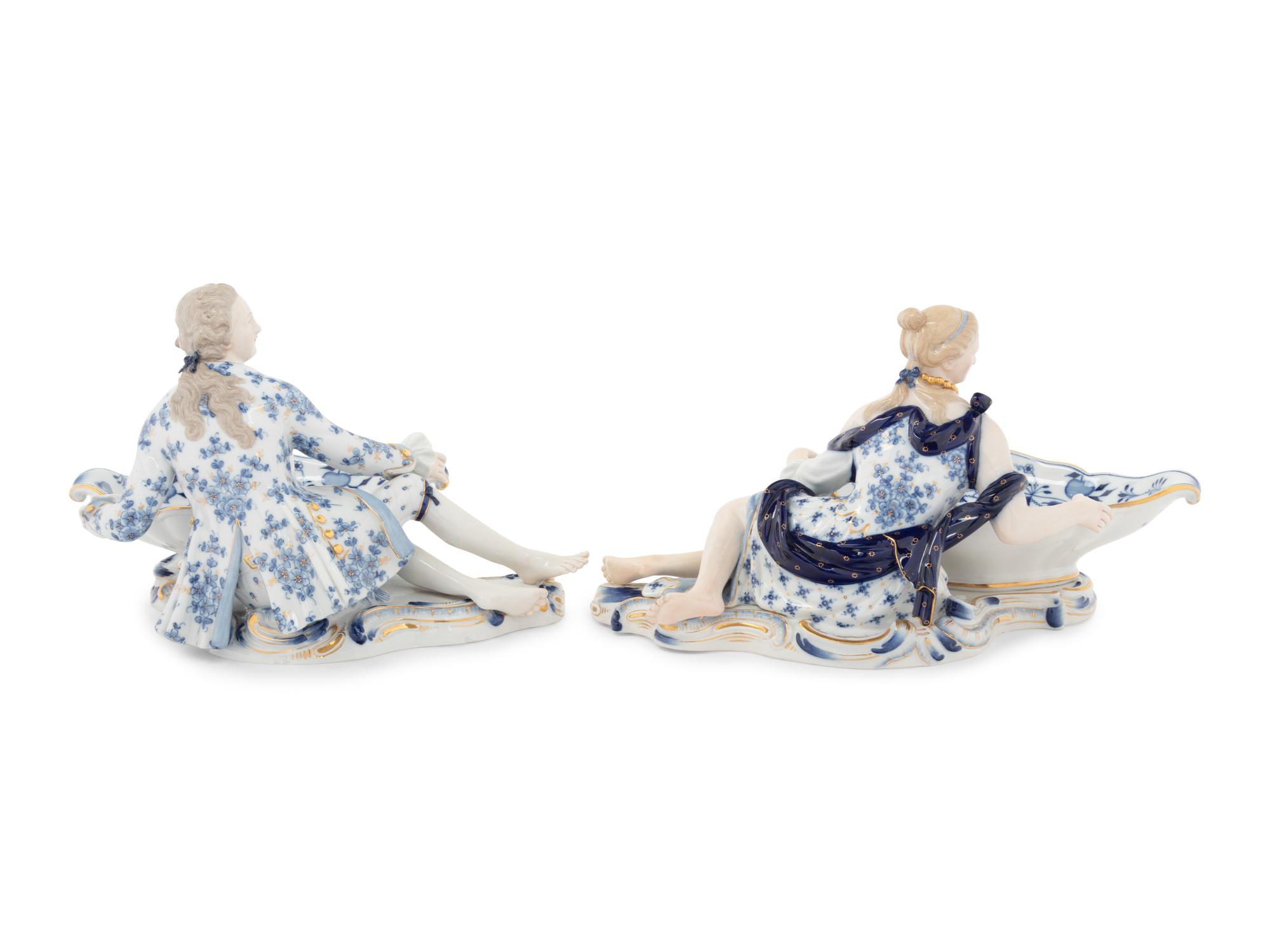 A Pair of Meissen Porcelain Blue Onion Figural Salts