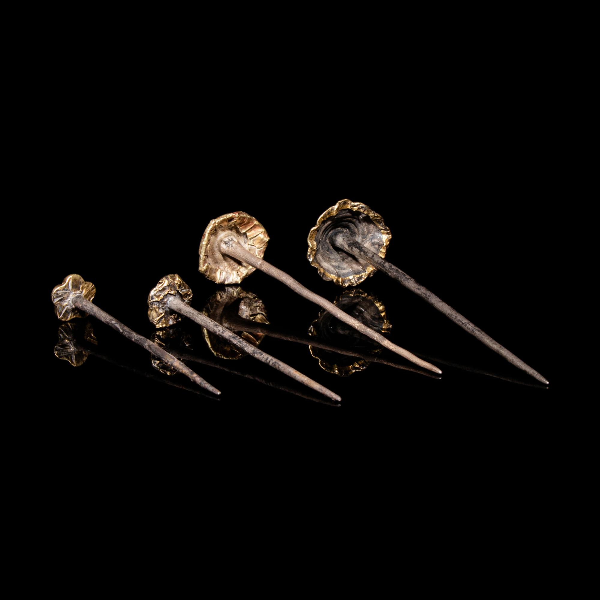 Four Chinese Silver Gilt 'Floral' Hairpins, Zan, Ming Dynasty 明 花卉紋金裹頭銀錐腳簪四支