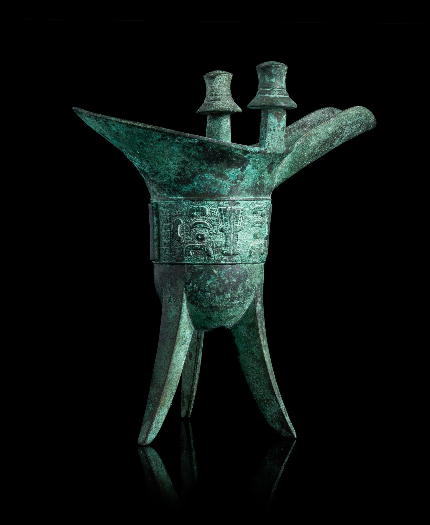 An Archaistic Bronze Mirror Diameter 7 3/4 inches.