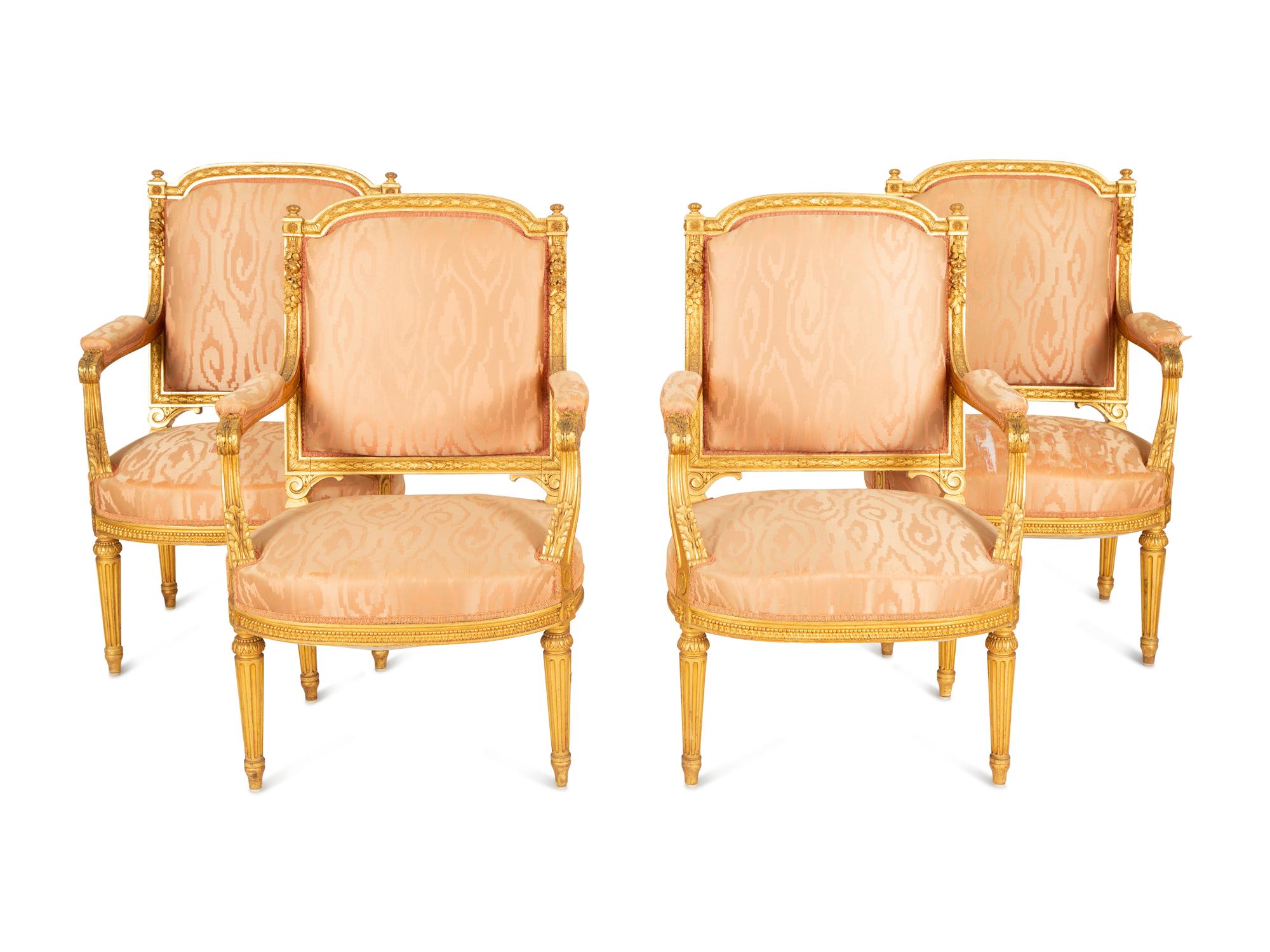 A Set of Four Louis XVI Style Giltwood Fauteuils — Late 19th/Early 20th Century