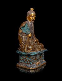 A Chinese Gilt Highlighted Robin's Egg Glazed Porcelain Figure of an Immortal