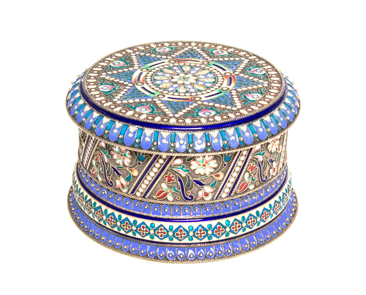 A Russian Enameled Gilt-Silver Box, Khlebnikov, St. Petersburg, 1908-1926, of cylindrical form with hinged lid and with polychrome flor
