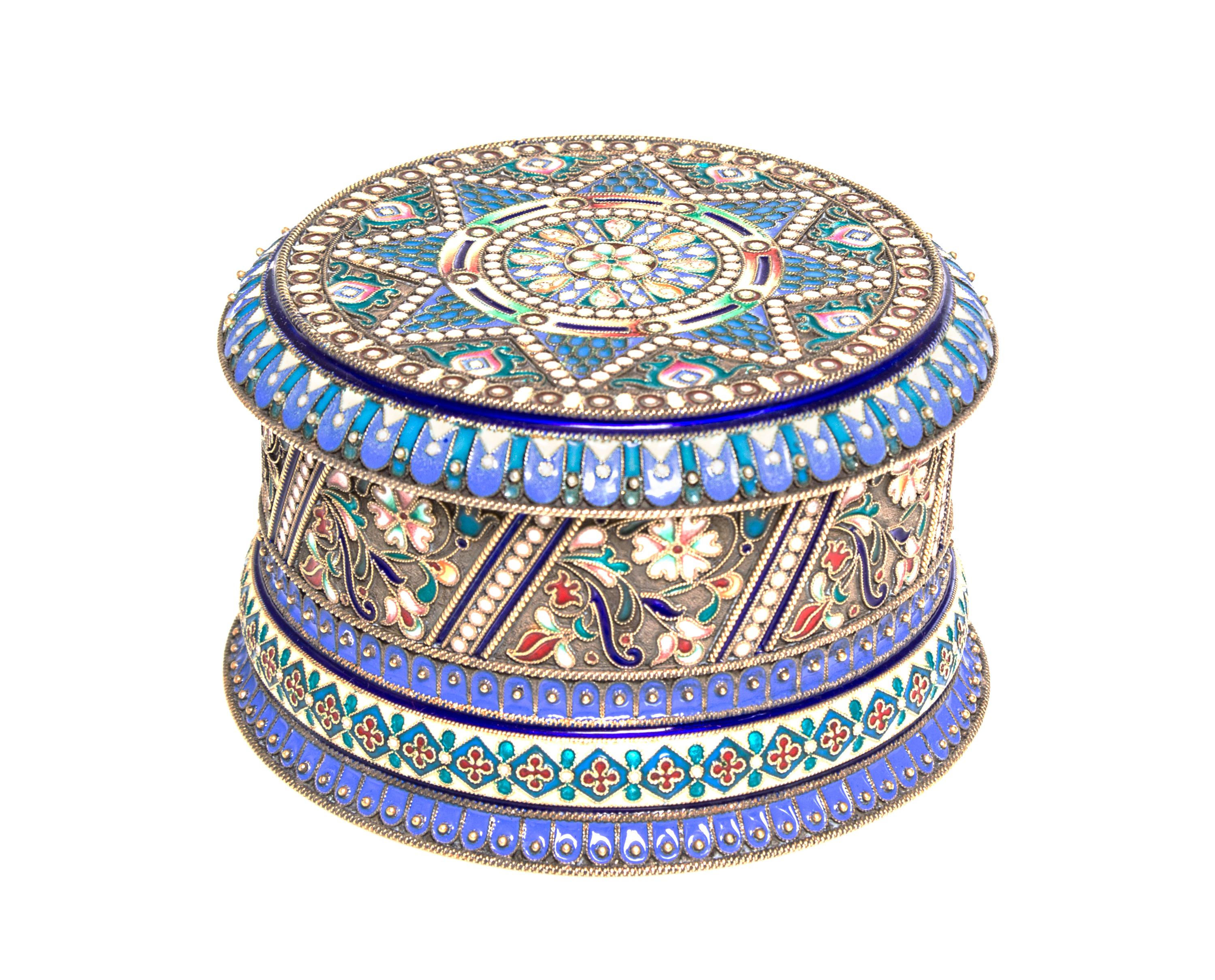 A Russian Enameled Gilt-Silver Box, Khlebnikov, St. Petersburg, 1908-1926, of cylindrical form with hinged lid and with polychrome flor