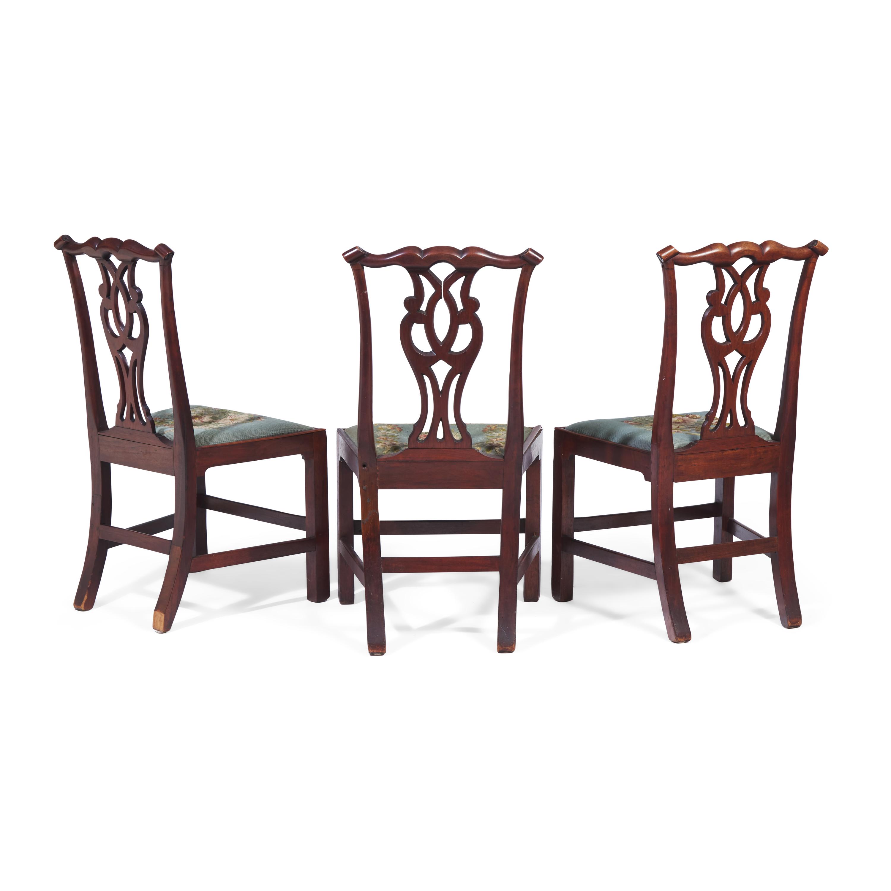 A Group of Three George III Carved Walnut Side Chairs