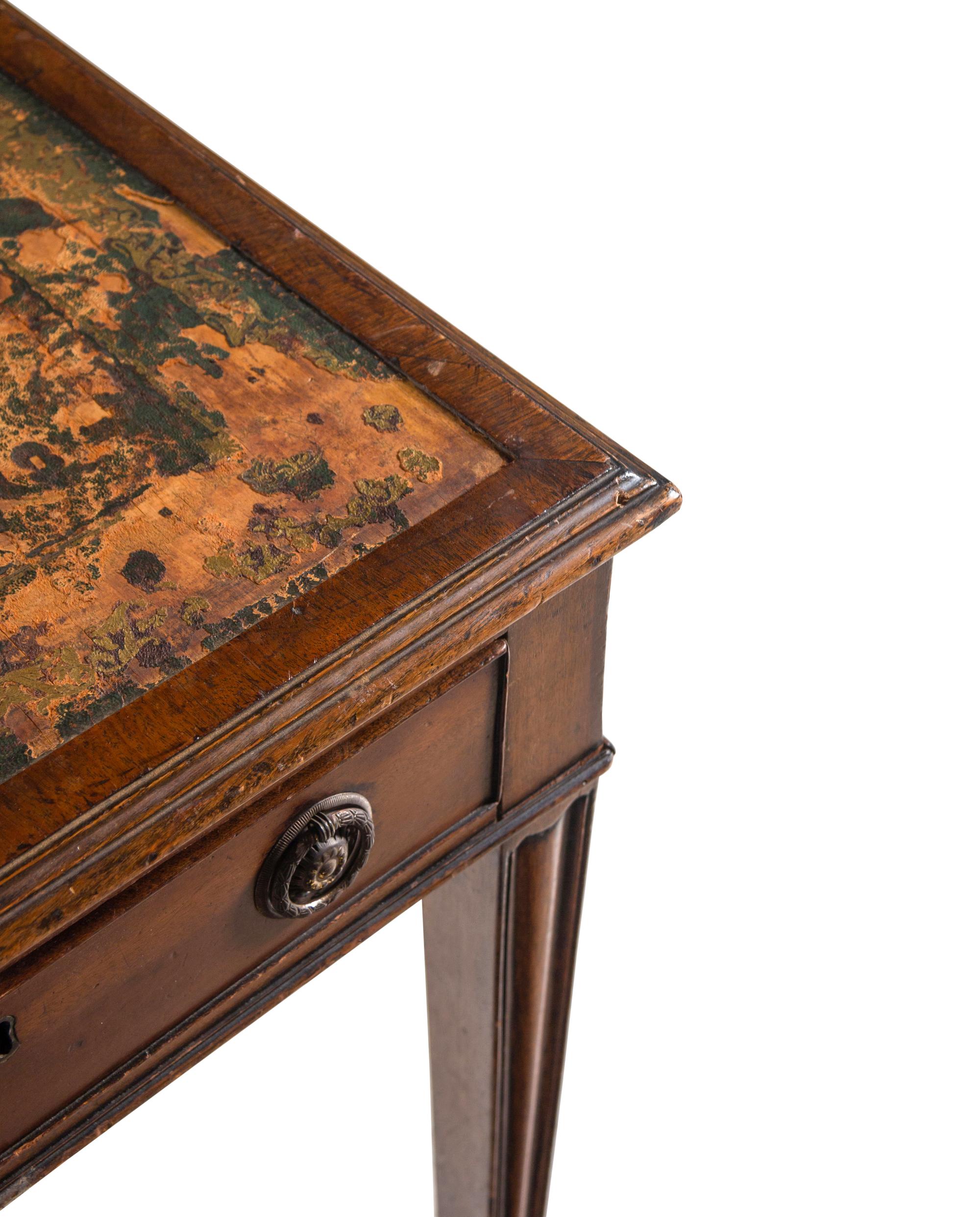 An Edwardian Leather Upholstered Mahogany Writing Desk
