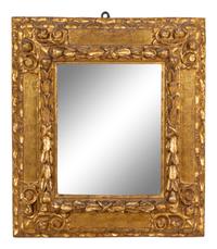 A Continental Carved Giltwood Mirror