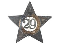 [CIVIL WAR]. A group of 3 items identified to George J. Putney, Company E, 29th Ohio Infantry, comprised of a silver corps badge engraved with battle honors, embellished canteen, and book taken from wreckage at Bristoe Station.