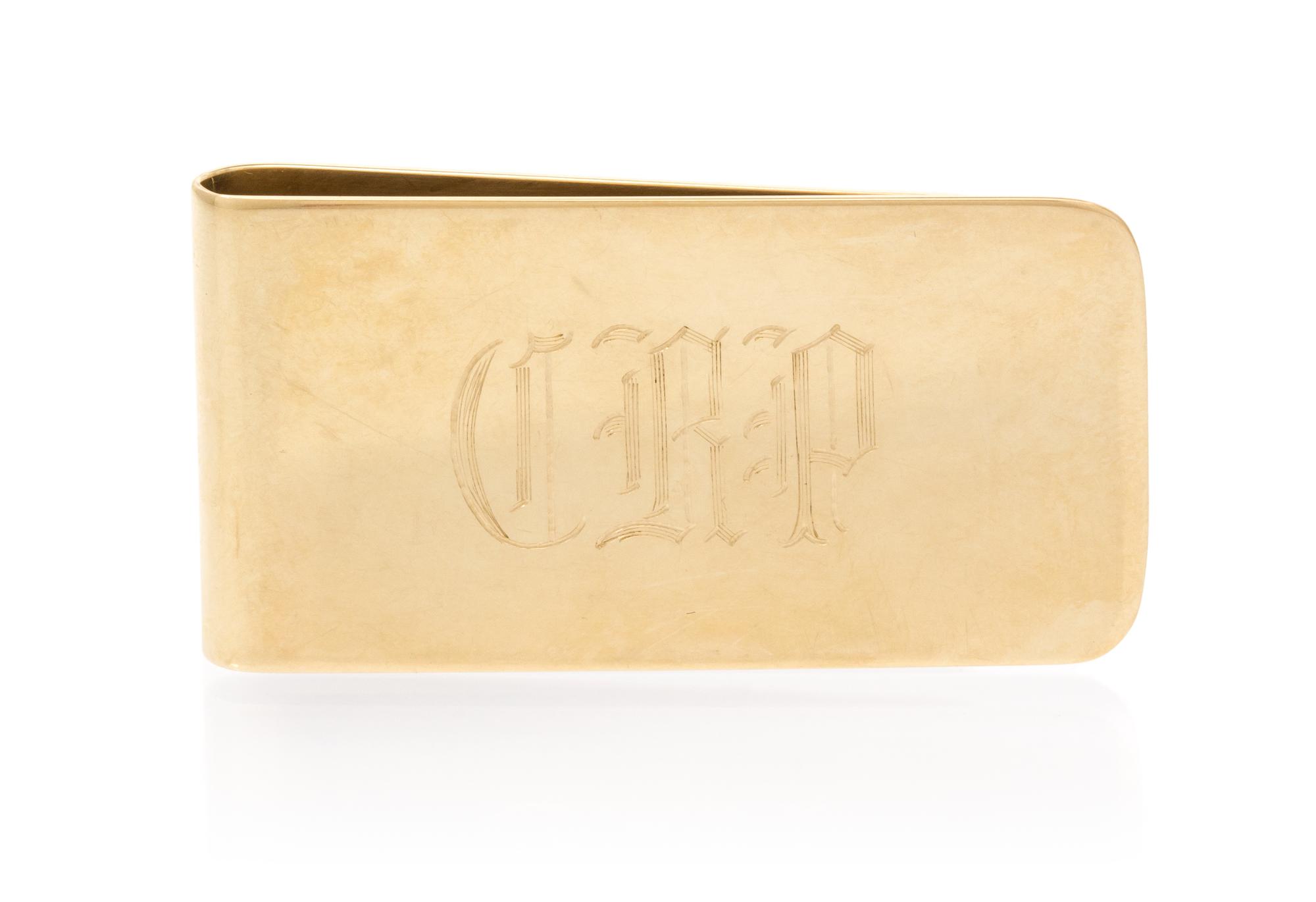 A 14 Karat Yellow Gold Money Clip. 21.50 dwts.