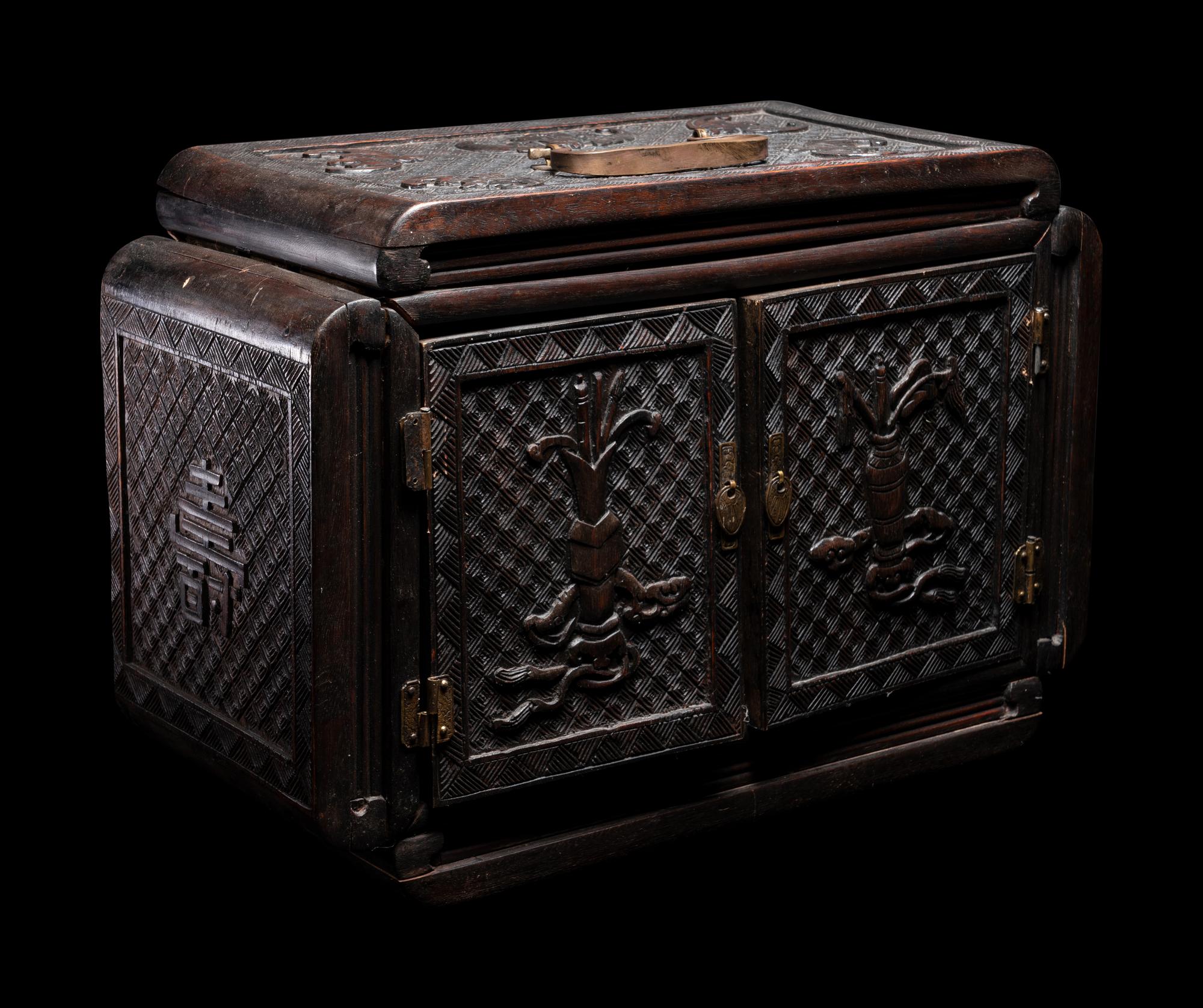 A Chinese Carved Rosewood Chest