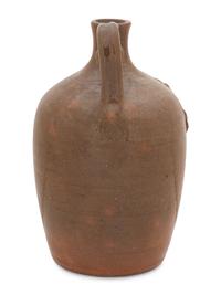 A Cole Pottery Glazed Stoneware Face Jug