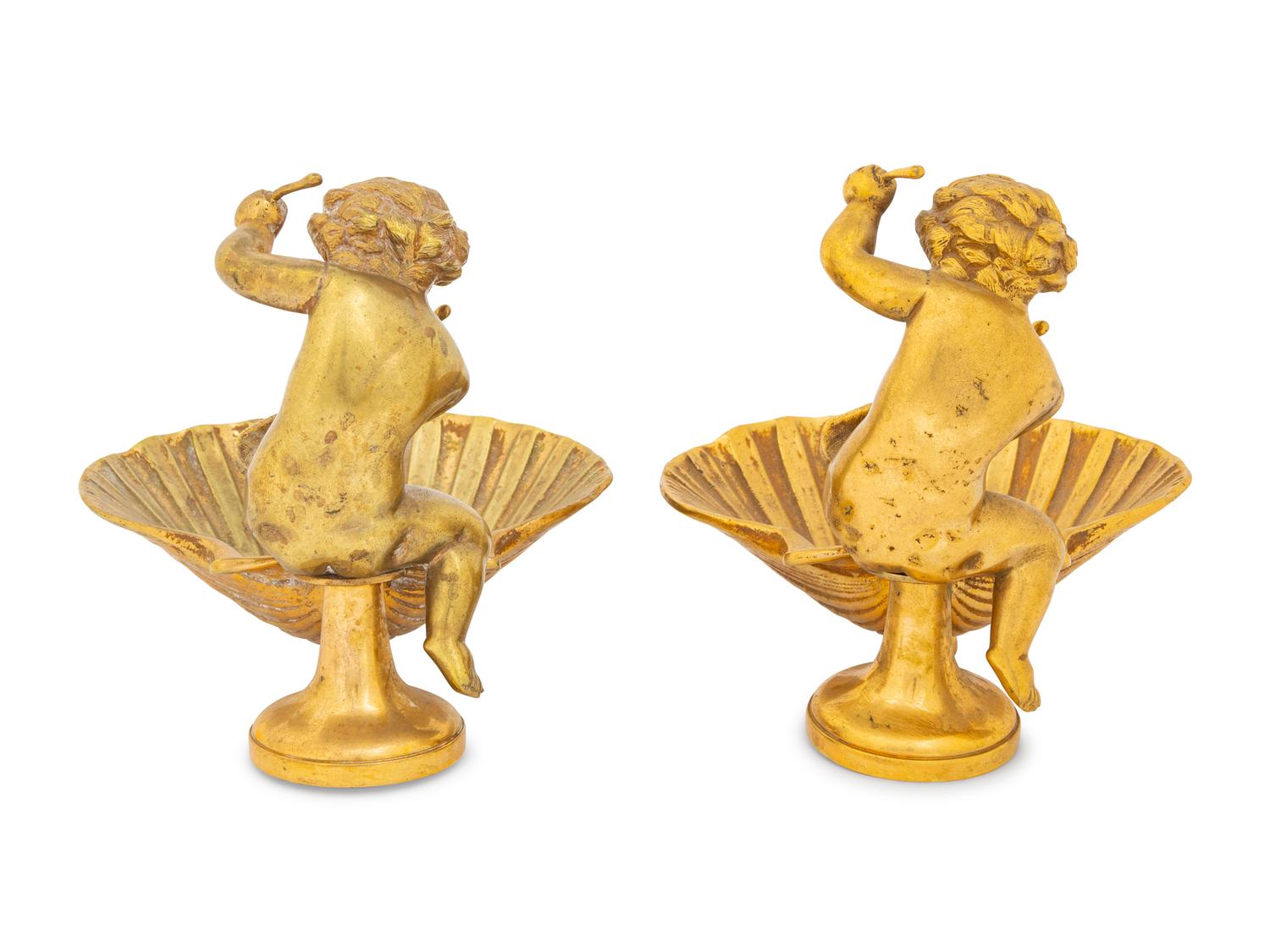 A Pair of Continental Gilt Bronze Putto and Shell Ornaments