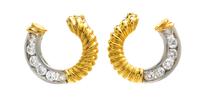 A Pair of 18 Karat Gold and Diamond Earclips, 5.90 dwts.
