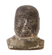 A Carved Stone Head of Buddha