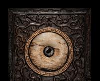 A Chinese Jade Bi Disc Inset Hardwood Table Screen