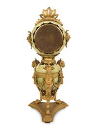 A French Gilt Bronze and Glazed Pottery Clock — LATE 19TH CENTURY